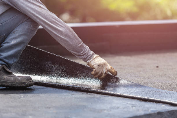 Professional Interior Drainage System technician working in Lima, NY